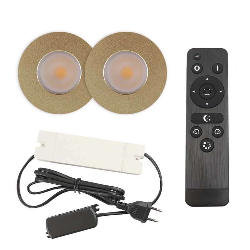 2 focos empotrables de color latón para porche Dico, IP65, con set de conexión y mando a distancia 2 focos empotrables de color latón para porche Dico, IP65, con set de conexión y mando a distancia